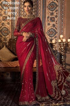 The latest Pakistani Wedding Maroon Red Saree Dress is a traditional yet classy choice for a Bride for her big day. This breathtaking Bridal Saree has a premium quality Chiffon fabric and is perfectly stitched according to the customer's demand. Embroideries and embellishments enhance the glamour of this Saree Dress. Embroidered chiffon saree handmade work with velvet lace Raw silk Blouse with handmade work Embroidered Chifffon sleeves with handmade work Handmade Neckline Handmade velvet pallu p Latest Pakistani Dresses, Pure Chiffon Sarees, Pakistani Dresses Online, Designer Sarees Collection, Pure Chiffon, Maria B, Party Kleidung, Embroidery Saree, Red Saree