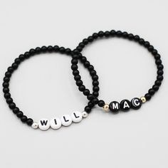 With Jewel Ya personalized beaded bracelets you can wear your unique style everyday. If you have a meaningful word, name or initials you'd like to wear we can make it! We love your custom projects. Matte Black Onyx Beaded Bracelet with your choice of 4mm, 6mm or 8mm beads and your preferred size. Input word, initials or personalization. Easy wear and effortless stacking with sturdy stretch cord design. Every Jewel Ya design arrives in our acrylic container for clean and air-tight storage Contact Word Affirmation, Acrylic Containers, Bracelet Stacking, Black Onyx Bracelet, Onyx Bracelet, White Jade, Onyx Bead, Jewelry Cleaner, Silver Accents