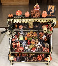 a display case filled with lots of halloween decorations