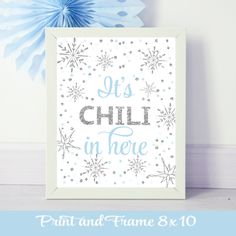 a snowflake with the words as chill in here on it next to some paper flowers