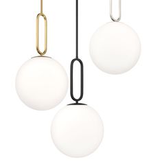 three light fixtures hanging from the ceiling, one white and one black with gold accents