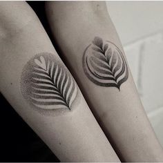 two tattoos on the arms of people with leaves and dots in them, one is black and white