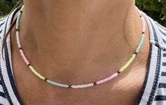 Minimalist White Beaded Necklaces With Faceted Beads, Minimalist White Beaded Necklace With Faceted Beads, Summer Gift Beaded Necklace With Faceted Beads, Summer White Necklaces With Faceted Beads, Pastel Beaded Necklaces With Round Beads, Adjustable Pastel Beaded Necklaces, Beach Jewelry With Pastel Beaded Details, Dainty Crystal Necklace With Colorful Round Beads, Pastel Beaded Jewelry For The Beach