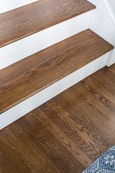 the stairs are made of wood and have no carpet