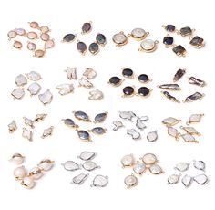 many different types of earrings on a white background