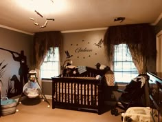 a baby's room decorated in black and white