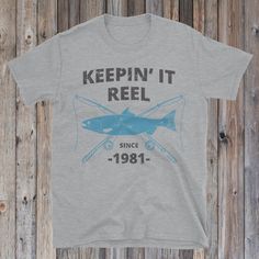 a t - shirt that says keepin'it reel since 1911