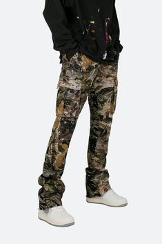 the Bootcut Cargo Pants are designed with our new B fit, which is slim through the thigh and features a slight flare at the leg opening and is constructed from washed camo twill, with a vintage wash and paint splatter, and finished with a contrasting camo panelling. details flare at leg opening 100% cotton model is 6’1, 140 lbs and wears a size 30 Bootcut Cargo Pants, Gray Hoodie Outfit, Cargo Pants Grey, Best Cargo Pants, Birthday Fits, Street Fashion Men Streetwear, Black Cargo Pants, Mens Fashion Streetwear, Tomboy Style Outfits