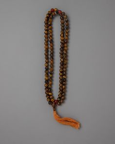 Experience spiritual strength and grounding with our AAA Grade Brown Tiger Eye Japa Mala. Crafted with 8mm beads, each infused with captivating brown Tiger Eye hues, it guides you on a journey of inner transformation and empowerment.

#evamratna #tigereye #evileye #MalaBeads Inner Transformation, Spiritual Strength, Brown Tiger, Brown Tiger Eye, Buddhist Traditions