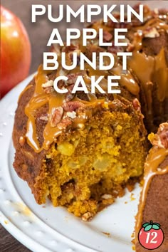 a close up of a cake on a plate with the words pumpkin apple bundt cake