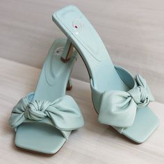 New In Box Brand: My Delicious Shoes Color: Light Teal Blue We Love The Flirty And Romantic Look Of This Sweet Knotted Bow Slip On Heels. Give Your Outfit A Fresh Look With Gorgeous Light Teal Blue Color Sandals Made With Soft Faux Leather. Trendy Square Open Toe Upper And A Curved Vamp That Boasts A Knotted Bow Detail. Also It Has Squared Shape Heel Finish For More Modern Look. Slide-On Design And A Glossy Stiletto Heel Complete The Look! Channelize Your Inner Diva By Accessorizing With The Tre Light Blue Pointed Toe Sandals For Spring, Spring Light Blue Pointed Toe Sandals, Light Blue Sandals For Spring Party, Light Blue Round Toe Heels For Summer, Light Blue Party Sandals For Spring, Chic Light Blue Open Toe Heels, Chic Light Blue High Heel Sandals, Trendy Light Blue Party Sandals, Chic Light Blue Open Heel Sandals