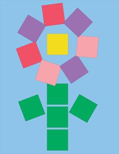 an art project with squares and rectangles arranged in the shape of a flower