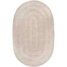 the oval rug is shown in beige