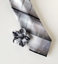 a tie with a flower on top of it