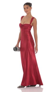 Designed in Los Angeles- Maxi Length- Zipper closure- Unlined- Made in satin fabric- Hand wash coldModel is wearing a size small that measures 57in/145cm in length Slight modifications might be made to improve garment quality.Handling the garments with care, hand-washing and air-drying is strongly recommended. Red Satin Maxi Dress, Red Silk Satin Dress For Formal Occasions, Fitted Satin Evening Dress With Lining, Red Satin Lined Dresses, Red Fitted Satin Dress For Formal Occasions, Fitted Lined Satin Dress, Long Red Dress, Satin Maxi, Dress Satin