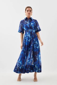 Tailored with artful reverence, this midaxi shirt dress cascades with easygoing elegance, structured by a point collar bodice and split hem. Appearing with flourishing florals, this short-sleeved silhouette calls for towering platforms and polished leather accessories.Point collarShort sleevesBelted waistSplit hemMidaxi lengthExpertly designed for those 5'3" and under, our Petite pieces are perfectly proportioned for a smaller frame using shorter lengths. Small Frame, Karen Millen, Split Hem, Fashion Face, Leather Accessories, Dress Collection, Bodice, Split, Shirt Dress