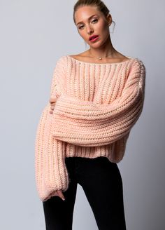 This intermediate level knitting project will become your favorite handmade sweater when you need an extra layer of coziness. This project is worked in two colors (A and B) and in several pieces, which are then seamed: the back, the front, and two sleeves.  Color A = 4 [4, 6, 6] skeins.  Color B = 4 [4, 6, 6] skeins.  The model wears size: M Mohair Sweater Pattern, Knit Sweater Pattern, Winter Knitting Patterns, Criss Cross Sweater, Handmade Sweater, Knitting Kit, Knitting Kits, Mohair Sweater, Crochet Kit