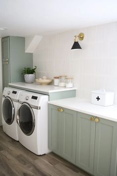 a washer and dryer in a small room