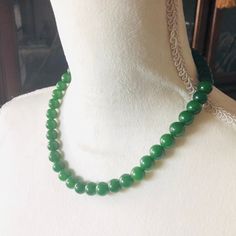 Genuine nephrite jade 10mm round bead necklace, silver plated barrel clasp, heavy weight hand carved natural stone, stones are cold to the touch and tested as shown in listing, amazing quality, new condition, will come gift boxed, 69.9 grams, 18" long.  Jade has long been considered to bring luck to the wearer, longevity and wisdom! Beaded Jade Necklaces With Gemstone Beads, Jade Beaded Necklaces With Gemstone Beads, Jade Beaded Necklace With Gemstone Beads, Jade Emerald Necklace With Round Beads For Healing, Jade Beaded Necklace With Polished Beads, Classic Jade Necklaces With Round Beads, Classic Green Beaded Necklaces With Round Beads, Classic Jade Necklace With Round Beads, Elegant Jade Beaded Necklace With 8mm Beads