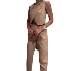 Elevate your style game with our chic Round Neck Button Top Pant Suit! Perfect for summer, this ensemble exudes European and American flair, featuring a timeless round neck design and stylish button accents. The set includes a flattering top paired with versatile straight pants, offering a perfect balance of comfort and sophistication. Elegant Two-piece Pantsuit For Summer, Elegant Two-piece Summer Pantsuit, Chic Cropped Two-piece Set, Chic Two-piece Summer Pantsuit, Summer Office Solid Color Sets, Solid Color Office Sets For Summer, Summer Office Sets In Solid Color, Elegant Cropped Two-piece Set, Summer Two-piece Tops For Workwear