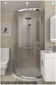 a bathroom with a stand up shower next to a toilet