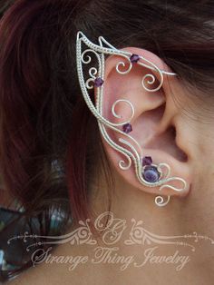 Elven ear cuffs Purple Joy by StrangeThingJewelry on Etsy Silver Fantasy Ear Cuff For Party, Silver Fantasy Cartilage Earrings For Gift, Silver Fantasy Style Cartilage Earrings As Gift, Fantasy Style Silver Cartilage Earrings For Gifts, Handmade Silver Fantasy Body Jewelry, Fantasy Style Festival Ear Cuff For Pierced Ears, Handmade Silver Ear Cuff For Party, Fantasy Silver Ear Cuff For Party, Unique Silver Ear Climbers For Party