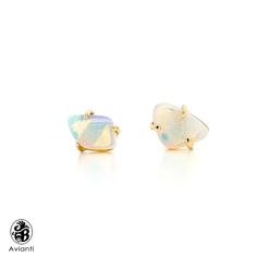 "These are beautiful Stud Boulder Opal Earrings with Yellow Gold. These Rainbow Opals are wearable as a simple and sweet accessory or with an everyday outfit. This piece is from our \"Opalescence Collection\". Each stone is unique and natural, one of a kind, hand picked. We design the piece based on the shape of the stone, to give it it's unique personality. [MATERIALS] Center Stone: Opals (2) Type: Australian Boulder Opals Play of Color: white with green hues Carat: Approx. 1.83 Transparency: O Opal Earrings For Wedding, Formal Opal Gemstone Earrings, Opal Gemstone Earrings For Anniversary, Yellow Gold Opal Gemstone Earrings, Elegant Ethiopian Opal Earrings As Gift, Sweet Accessories, Rainbow Opal, Australian Boulder Opal, Opal Earrings Stud