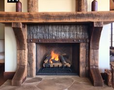 a fire place with logs in the fireplace