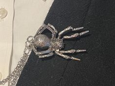 These sweater pins feature large deep silver toned spiders. Sweater pins and clips were very popular in the 1950s and are very much making a comeback today with the trend in retro wear.  These spiders have alligator style clips on the back to secure to your sweater or blouse.   The spider are attached with a double strand of deep silver toned metal chain.  See the photos for the measurements  Your spiders will arrive in a bubble padded envelope.   If you need special arrangements please let me know.   Thank you for checking out items from the Jeweled Spider. Jeweled Spider, Sweater Clips, Sweater Pin, Sweater Clip, Columbia Sc, The Spider, Shoe Clips, The Trend, Metal Chain