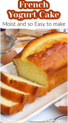 a loaf of french yogurt cake on a white plate with the words, moist and so easy to make