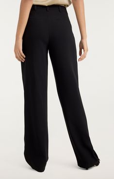 Introducing the ultimate wardrobe staple - the Becca Pant! Made from luxurious drapey crepe, these trousers feature pleated detailing and a wide leg for a flattering and stylish look. Perfect for any occasion, these pants are a must-have for your wardrobe. Details Zipper fly and button closureFabric: Drapey CrepeStraight legDraping detailsFull length Content and Care 69% Triacetate 31% PolyesterDry CleanImported Measurements 34.5in/87.63cm, inseamMeasurements from size 4 Crepe Pants, Denim Chic, High Hips, Parisian Chic, Pants Black, Wardrobe Staples, Black Pants, Full Length, Straight Leg