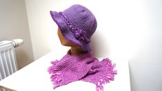 Beautiful hand crochet purple fedora / cloche / hat / beret / beanie / skullcap with lovely ruffle brim with variegated (melange) fringed scarf.  It is not original set, but items fit nicely together. Made of wool blend yarn. Hat is decorated with romantic rope flower and strap. Non itchy. Fits most adult and teen sizes -  stretchable. SIZE. The height of hat is 8.5'' (21.5 cm) brim including. Scarf is 9"(23 cm) wide and 70" (99 cm) long. Ready to ship.  Care: If needed, use delicate handwash wi Handmade Fitted Brimmed Crochet Hat, Adjustable Hand-knitted Purple Hat, Purple Hand Knitted Adjustable Hat, Purple Adjustable Hand Knitted Hat, Adjustable Purple Hand-knitted Hat, Adjustable Purple Hand Knitted Hat, Handmade Purple Winter Hat, Purple Yarn Hats For Spring, Purple Brimmed Crochet Hat