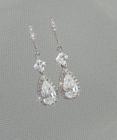 Crystal Bridal Earrings, Crystal Wedding earrings, Crystal earrings, Wedding Jewelry, Bridal Jewelry, Alicia Crystal Earrings via Etsy Elegant Teardrop Sterling Silver Bridal Earrings, Elegant Teardrop Bridal Earrings In Sterling Silver, Sterling Silver Teardrop Bridal Earrings With Elegant Design, Elegant Pear-shaped Chandelier Earrings As Gift, Elegant Teardrop Dangle Earrings For Wedding, Elegant Dangle Teardrop Earrings For Wedding, Delicate Formal Chandelier Earrings For Pierced Ears, Elegant Wedding Teardrop Dangle Earrings, Formal Long Drop Silver Bridal Earrings