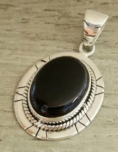 Black onyx and sterling silver handmade western style pendant Silver Work, Oval Stone, Oval Pendant, Western Style, Sterling Silver Pendant, Black Onyx, Handmade Silver, Western Fashion