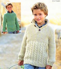 a young boy wearing a green sweater and blue jeans