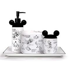 PRICES MAY VARY. Ceramic COMPLETE 4-IN-1 BATHROOM ACCESSORY SET: Update your bathroom’s décor with the most eye-catching 4-piece set that includes: a refillable pump dispenser for soap and lotions, a toothbrush and toothpaste holder, a cotton ball container with lid and a matching rectangle countertop tray. Is there a cuter way to organize your bathroom? We doubt it! AUTHENTIC SKETCHBOOK BATHROOM COLLECTION: Decorated with the cutest Sketchbook designs, our modern soap dispenser and toothbrush h Modern Bathroom Accessories Set, Countertop Tray, Mickey Mouse Bathroom, Disney Bathroom, 4 Piece Bathroom, Cotton Ball Holder, Toothbrush And Toothpaste Holder, Toothpaste Holder, Disney Home Decor