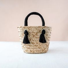 Basket handwoven from natural seagrass Handle braided from macrame cord Dimensions - Approx. L11" x W5.5" x H8" with 6" handle drop Made in the Philippines This mini modern straw bag features a rich herringbone pattern with natural seagrass fiber and braided cord handles. A perfect beach accessory for your weekend getaways or a daily companion to carry your essentials. Handwoven by women weavers in the Philippines using traditional techniques. Check out the Large size. Care: Spot clean only. Kee Herringbone Texture, Mini Moderns, Straw Tote Bag, Hand Woven Baskets, Natural Care, Straw Tote, Market Tote, Macrame Cord, Beach Accessories