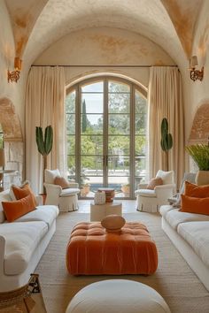 Boho-Mediterranean fusion living space with colorful textiles and potted plants Spanish House Living Room, Spain Living Room, Spain Living, Spanish Living Room