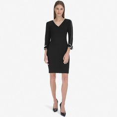 Show off your style in this Andrew Marc rolled long sleeve v-neck sheath dress. Click on this WOMEN'S GUIDE to find the perfect fit and more!Show off your style in this Andrew Marc rolled long sleeve v-neck sheath dress. Click on this WOMEN'S GUIDE to find the perfect fit and more!FEATURES V-neck Long sleeves Sheath silhouette Straight hem Hook-and-eye, zipper backFIT & SIZING True to size 37.25-in. length from shoulder to hem Mini length hits at the thighFABRIC & CARE Polyester, spandex Dry cle V-neck Stretch Bodycon Dress For Office, Elegant Career Dresses With 3/4 Sleeves, V-neck Stretch Bodycon Dress For Work, Elegant Fall V-neck Dress For Work, Spring Formal Stretch V-neck Dress, Elegant Stretch V-neck Dress For Work, Spring Stretch V-neck Dress For Formal Occasions, Elegant Long Sleeve Bodycon V-neck Dress, Elegant Long Sleeve V-neck Dress For Office