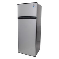 a silver refrigerator freezer sitting on top of a white wall