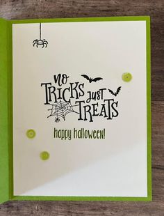 a halloween card with the words, no tricks just treats happy halloween written on it