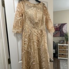 New Formal Dress Champagne Color. It Is Size 10 But Runs Size 8. Spring A-line Dress For Mother Of The Bride, Elegant Mother Of The Bride Midi Dress, Elegant Beige Mother Of The Bride Dress, Champagne Midi Dress For Wedding, Gold Midi Length Dress For Wedding, Fitted Champagne Dress For Mother Of The Bride, Champagne Midi Wedding Dress, Beige Floor-length Dress For Mother Of The Bride, Elegant Maxi Mother Of The Bride Dress