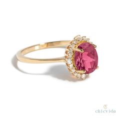 DetailsMaterial: 14k/18k gold Color Options: Yellow Gold, White Gold, Rose Gold, ★ Center StonePink Tourmaline, OvalSize: 5X7 mmApprox Weight (Ct): 0.96★ Accent StonesDiamond RoundSize: 1.1 mm * 12 No.s , 1.5 mm * 4 Nos.Approx Weight (Ct): 0.15★ Band Width: 1.3 mm★ Ring Height: 7 mm Pink Tourmaline Ring, Natural Gemstone Jewelry, 18k Gold Ring, Tourmaline Ring, Pink Tourmaline, 18k Rose Gold, Gold Rose, Gold Ring, Tourmaline