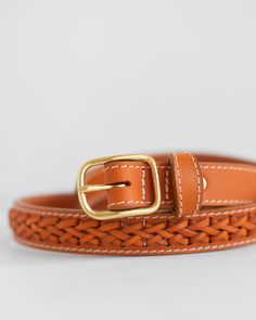 Lindquist's Vachetta leather belt is embellished with a two-strand braid and with a solid natural brass hardware. Strand Braid, Clog Boots, Braided Belt, House Shoes, Attention To Detail, Brass Hardware, Leather Belt, Honey, Braids