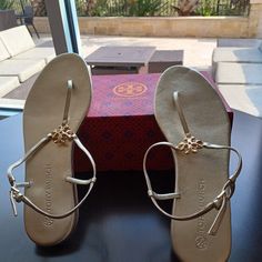 Capri Strap Sandal - Spark Gold Color Designer Gold Sandals For The Beach, Gold Elegant Flip Flops, Elegant Tan Sandals For Vacation, Elegant Closed Toe Tan Sandals, Tory Burch Slides, Tory Burch Espadrilles, Tory Burch Flip Flops, Rope Sandals, Miller Sandal