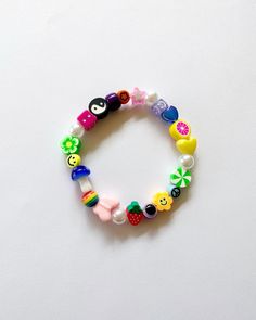 Handmade Adjustable Multicolor Charm Bracelet, Adjustable Multicolor Handmade Charm Bracelet, Playful Adjustable Multicolor Charm Bracelet, Handmade Multicolor Adjustable Charm Bracelet, Trendy Multicolor Beaded Wristband, Adjustable Multicolor Playful Beaded Bracelets, Playful Adjustable Multicolor Beaded Bracelets, Trendy Adjustable Multicolor Beads, Playful Multicolor Bracelet Wristband