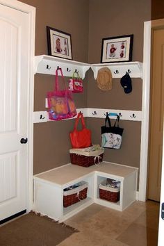 the entryway is clean and ready to be used as a storage area for purses