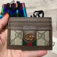 Authentic Gucci Ophidia Card Case, Like New With Tags Condition: Like New, Only Used Once, No Signs Of Wear, No Hairline Scratches, Could Pass As Brand New For Gifting! Comes With Original Dust Pouch, Original Box With Original Tags And Care Cards, Original Limited Edition Packaging And Gucci Ribbon For The Ultimate Gift! Gucci Brown Wallets With Interior Card Slots, Brown Gucci Wallets With Interior Card Slots, Designer Brown Bag With Card Slots, Luxury Brown Wallet With Interior Card Slots, Luxury Brown Wallets For Daily Use, Luxury Brown Wallet For Daily Use, Luxury Brown Rectangular Wallet, Designer Gold Wallet With Card Slots, Designer Gold Wallets With Card Slots