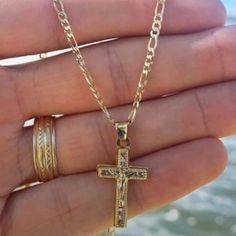 Elevate Your Style With Our Exquisite 14k Gold Filled Cz Jesus Cross Pendant With Figaro Link Chain. Crafted With Meticulous Attention To Detail, This Pendant Boasts A Unique Design Featuring The Sacred Image Of Jesus Christ Adorned With Shimmering Cubic Zirconia Stones. Brand New! Material: 14k Gold Filled Chain Length: 14", 16", 18" And 20" Inches Chain Style: Figaro Won’t Tarnish Water Resistant Hypoallergenic Nickel Free Cadena Para Mujeres Cuerda Para Ninos Enlace Para Bebs Soga Para Jovene Jesus Images, Jesus On The Cross, Chain Styles, Chain Lengths, Cross Pendant, Womens Jewelry Necklace, Cubic Zirconia, Gold Filled, Unique Designs