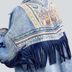 Unleash your inner free-spirit with our 2023 Spring-Summer Collection's Ornamented Fringe Denim Jacket for Ladies—a trendy-forward. hippie-inspired piece that's sure to make a statement!Why You'll Love This JacketExperience the perfect balance between quintessential sophistication and avant-garde style. Crafted with luxe denim and vintage-inspired embroidery. this jacket is a must-have for anyone who loves to express themselves through modern. Button-up closure and a raw hem add an edge to this Spring Bohemian Denim Jacket With Frayed Hem, Bohemian Denim Jacket With Frayed Hem, Spring Festival Denim Blue Outerwear, Summer Bohemian Outerwear With Frayed Hem, Festival Denim Jacket With Fringe And Long Sleeves, Fall Festival Denim Jacket With Fringe, Spring Festival Denim Jacket With Fringe, Festival Denim Fringe Outerwear, Festival Long Sleeve Outerwear With Frayed Hem